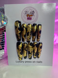 Gold & Black Snake Charms